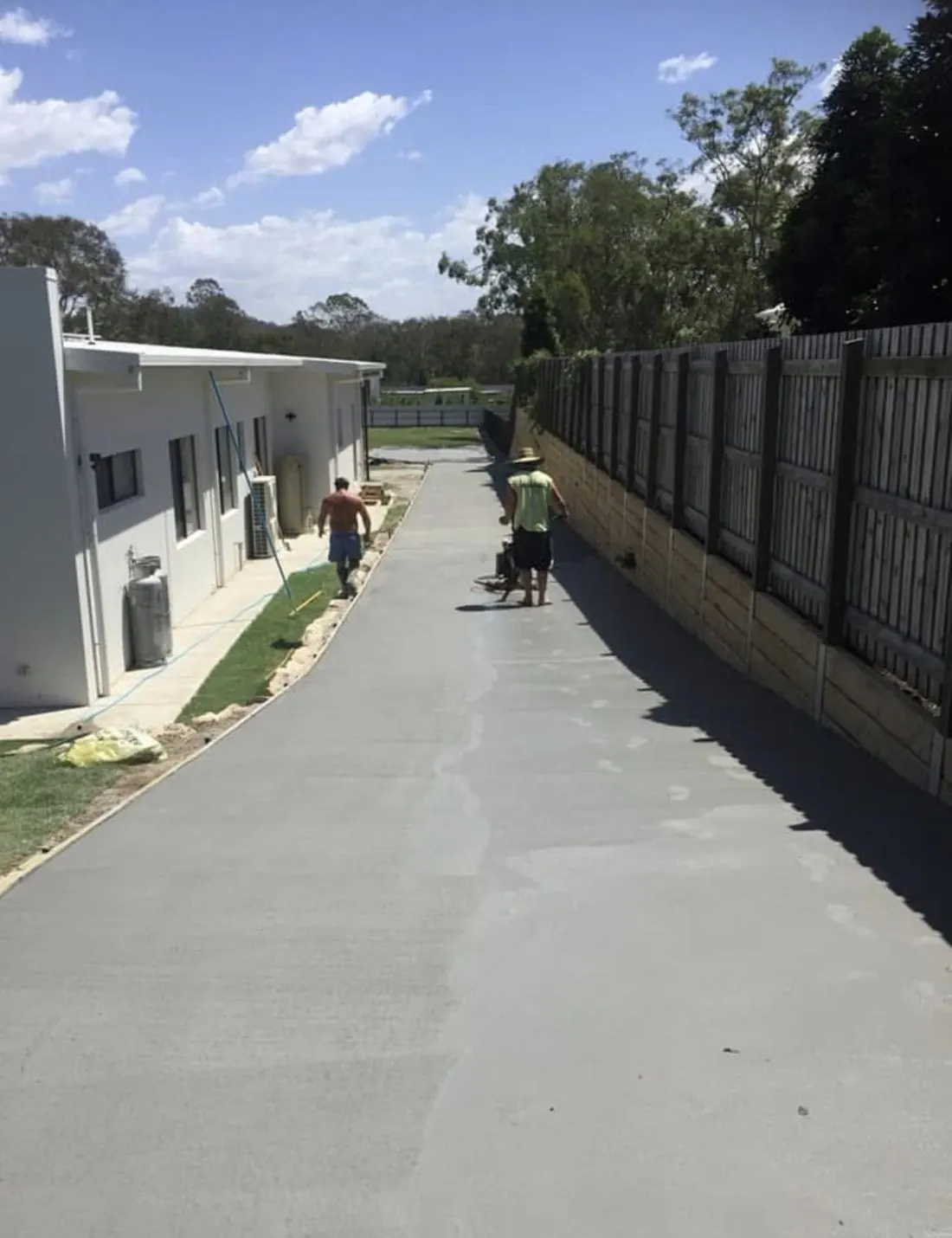 Side-access driveway — Broom finish